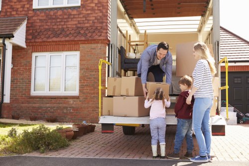 House removals team helping a family move in Balham