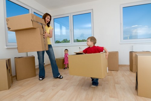 Professional moving team loading household items for a Balham relocation