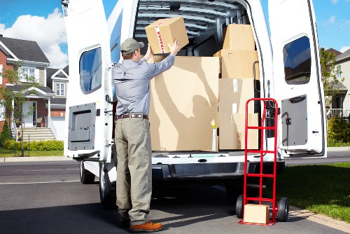 Loading furniture into a van for a local Balham relocation