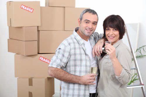 Packed moving boxes and furniture ready for transport